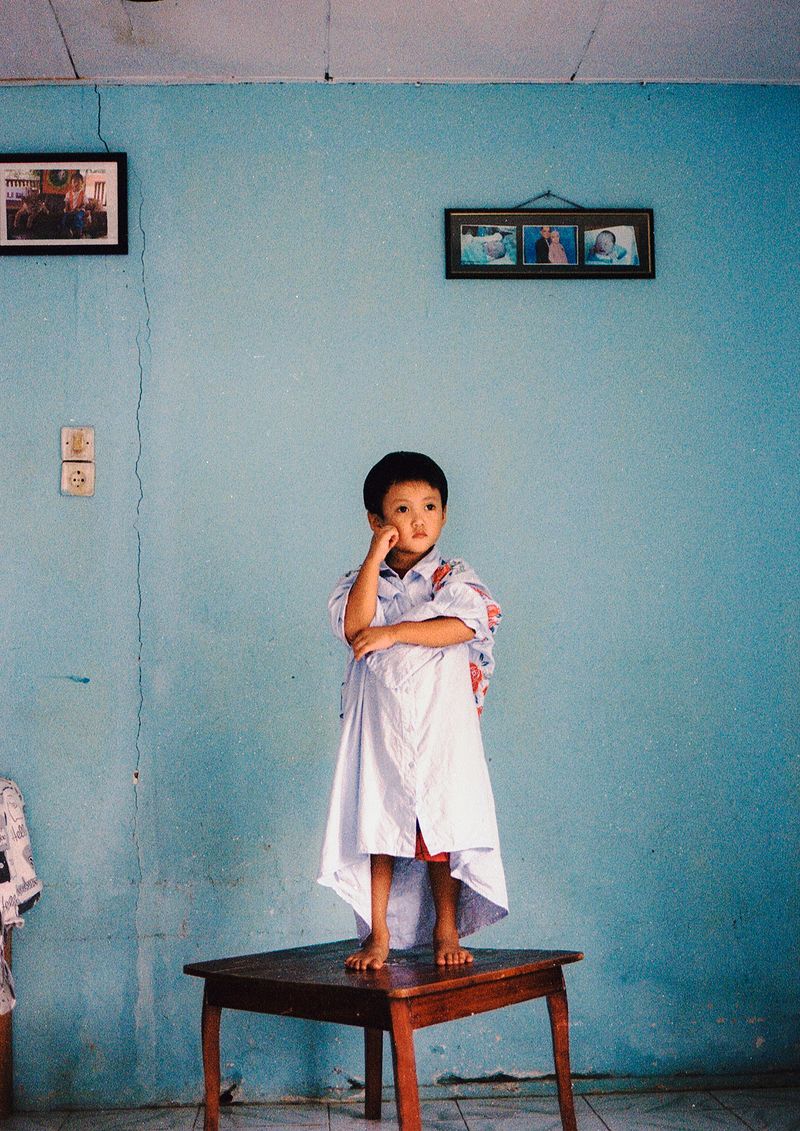 © Farid Renais Ghimas - Fuazan Posing in His Mum's Clothes, 2022