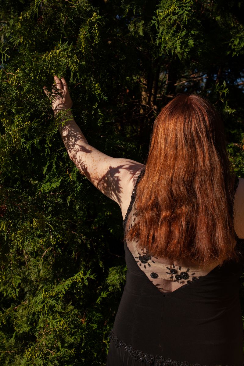 © Arina Titova - My grandmother in her black dress.