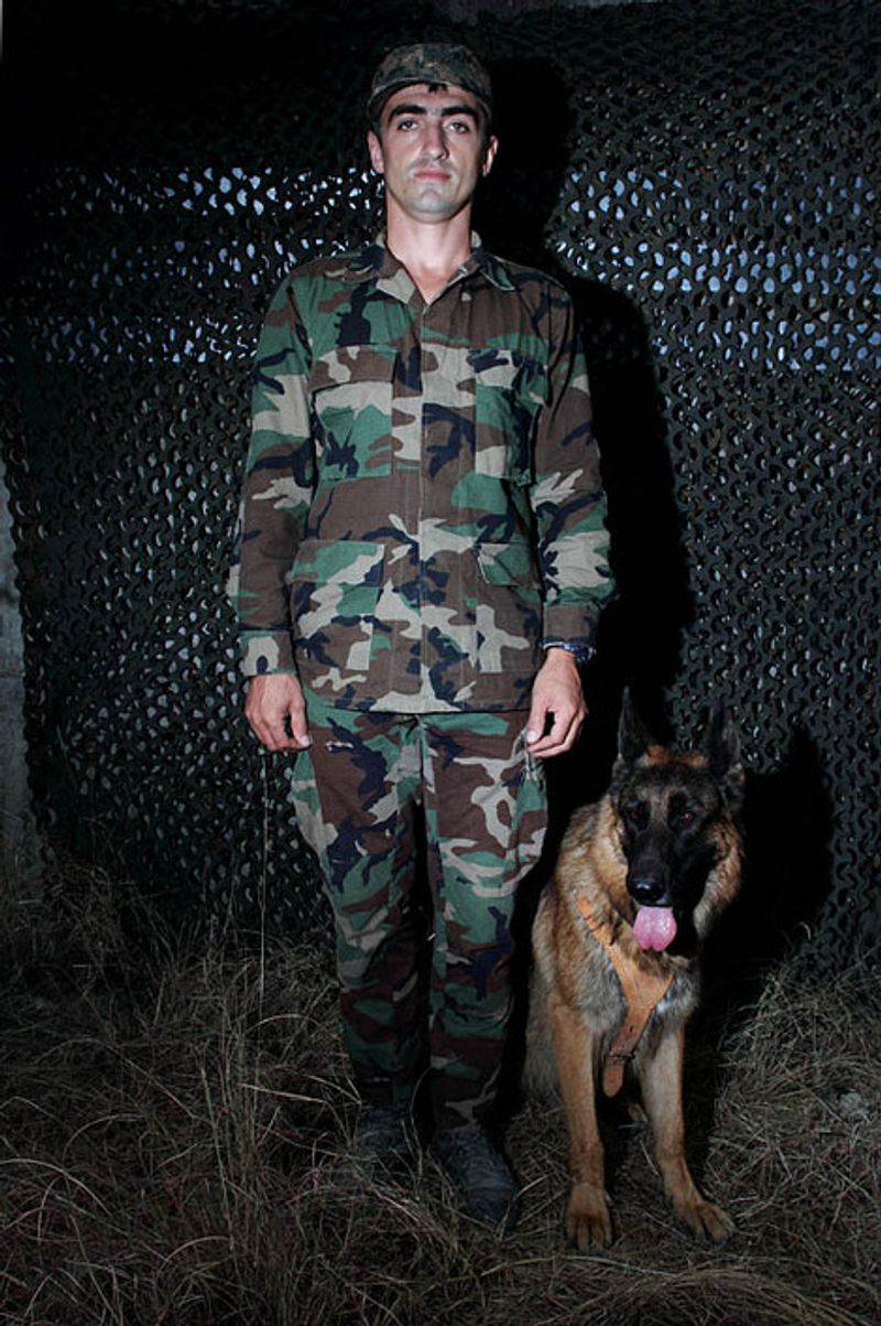© Yuri Ivashchenko - Cynologist Gadzhimurad with his dog Nero