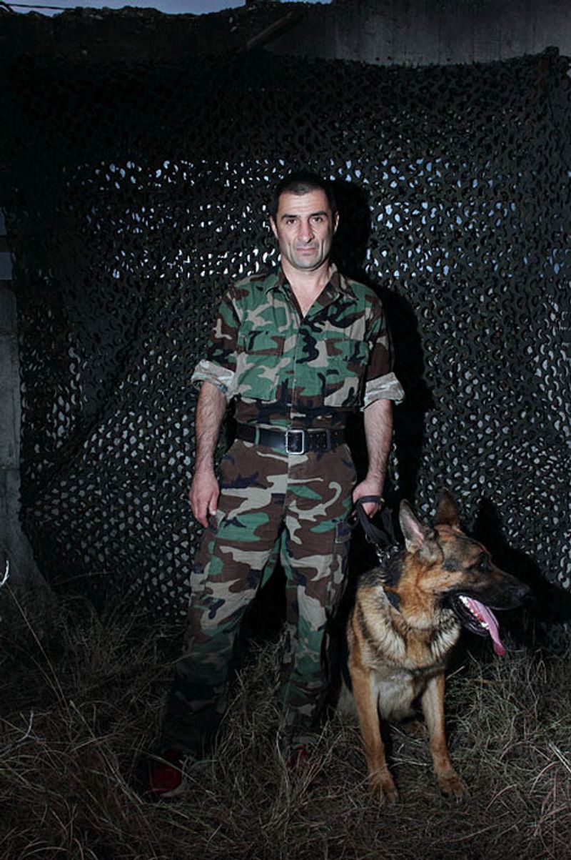 © Yuri Ivashchenko - Cynologist Arsen with his dog Ergan