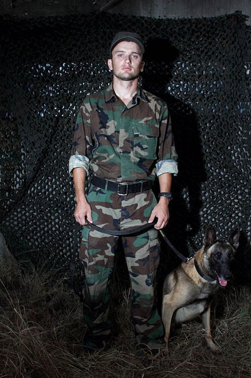 © Yuri Ivashchenko - Cynologist Omar with his dog Gris