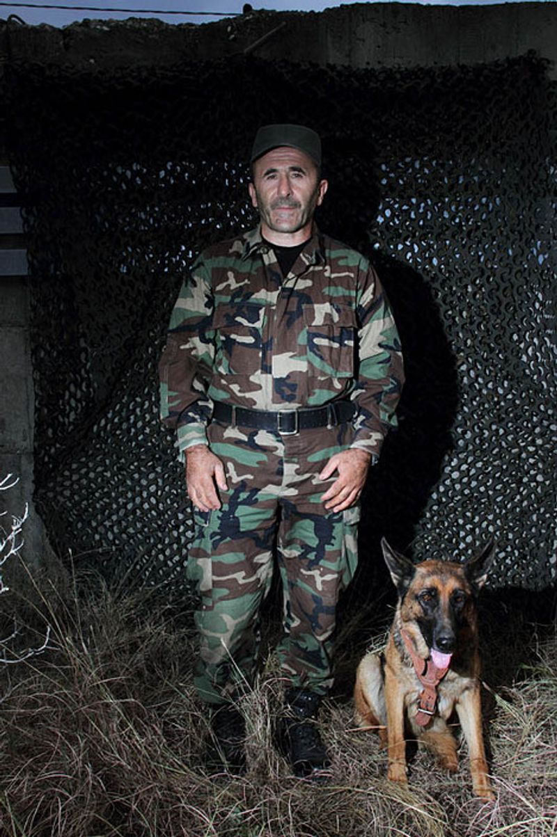 © Yuri Ivashchenko - Cynologist Ismail with his dog Rada