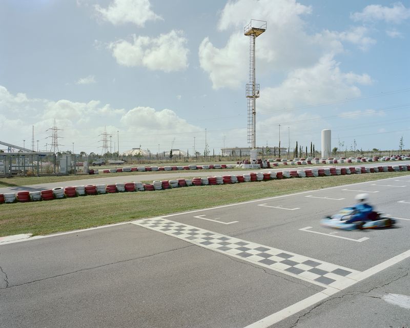 © Pietro Viti - A go-kart track just outside Torrevaldaliga Nord coal plant. Torrevaldaliga, Civitavecchia, 2015.