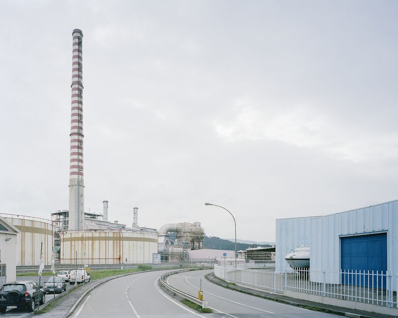 © Pietro Viti - The tall chimney of the “Eugenio Montale” coal plant, in the industrial zone of La Spezia. La Spezia, 2015.