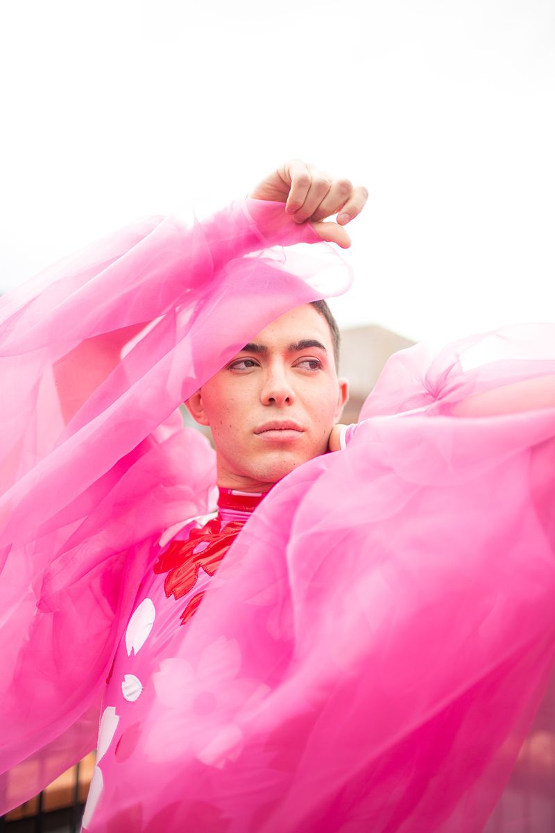 © Lindsay Morris - Elias in an outfit he designed and constructed to echo a dress worn at camp in 2011.