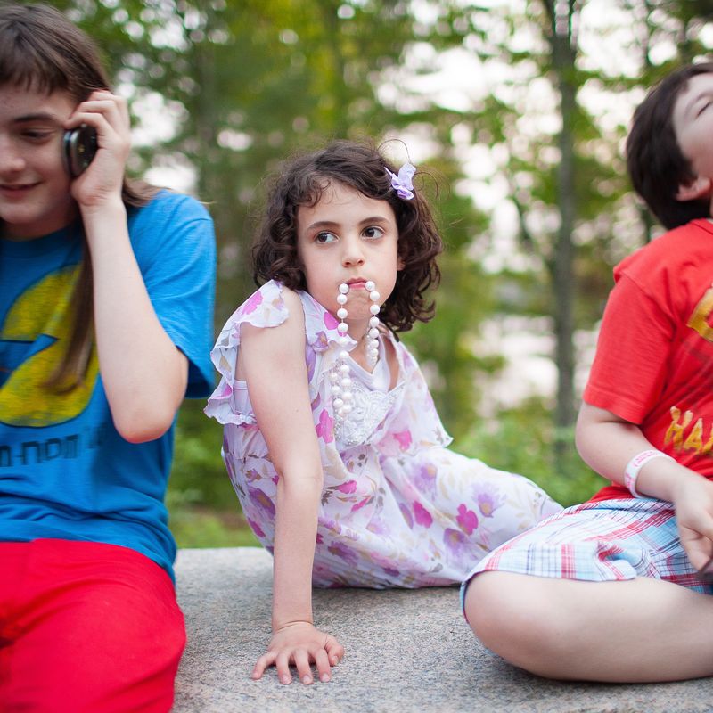 © Lindsay Morris - Hannah, taking some downtime with friends at camp between events (2011).