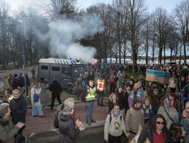 © Sean Charlton White - A moment of contemplation amid the protest, Extinction Rebellion second A12 blockade in The Hague.