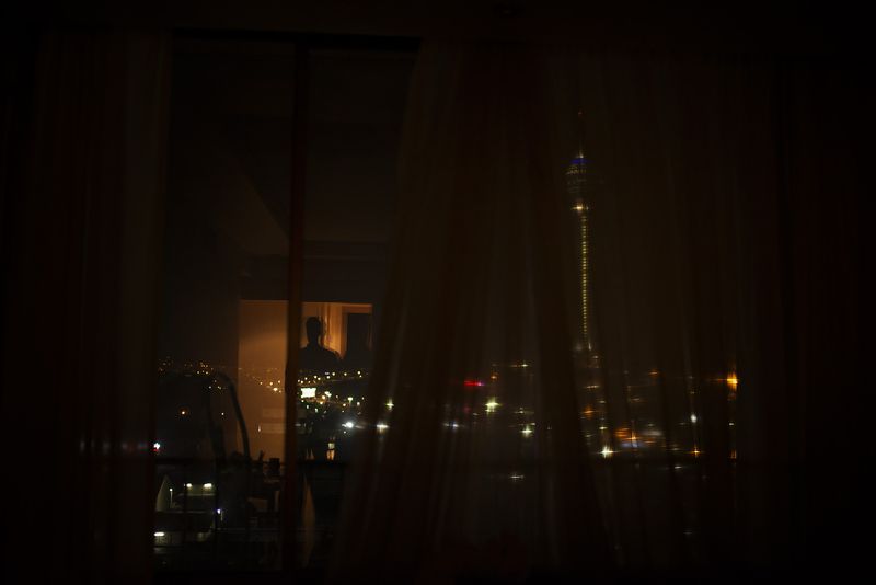 © Marjan Yazdi - Reflection in the window with the landmark of Tehran, Milad Tower.