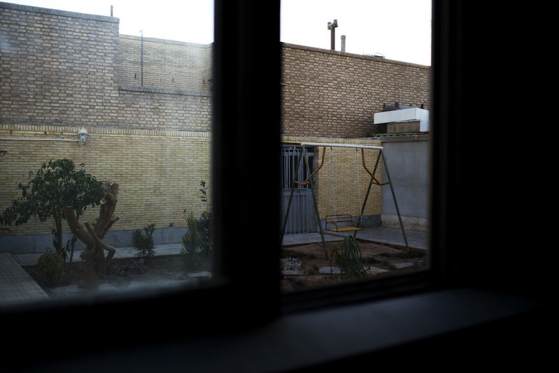 © Marjan Yazdi - Looking out the window.