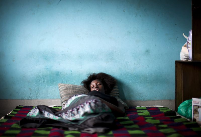 © Anne Ackermann - Shidda, a student, dozes in her bedroom. She shares a small place with her boyfriend.
