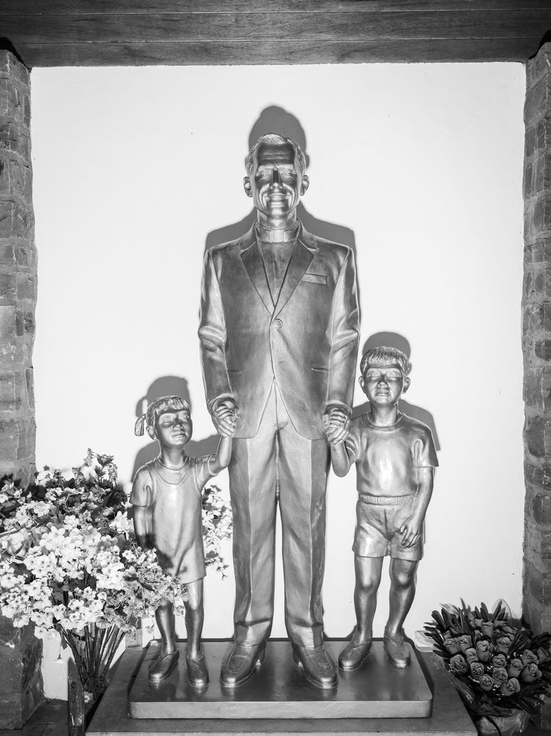 © Matthias Jung - Monument to a priest at the pilgrimage site of Banneux