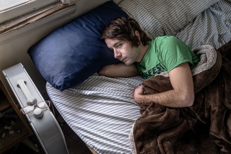 © Jordan Gale - Portrait of Rob in bed.