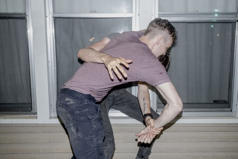 © Jordan Gale - Will & Jon wrestling on the front porch.