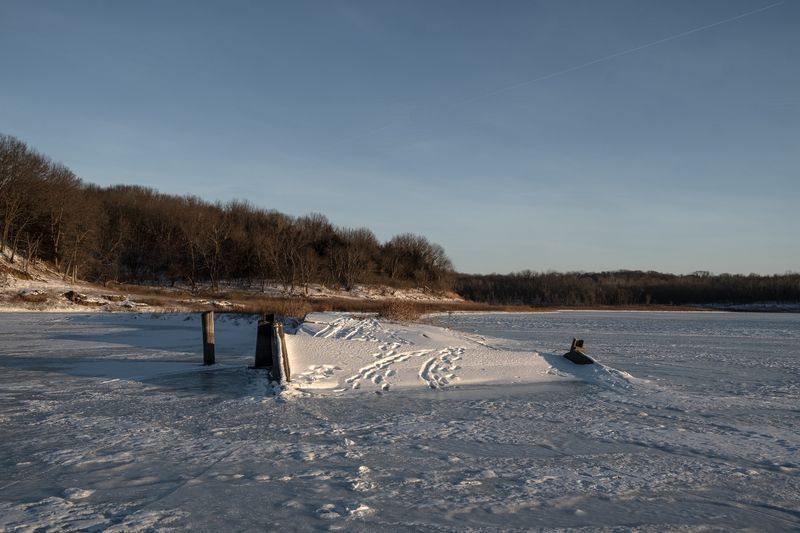 © Jordan Gale - A frozen over backroad bridge, just outside of my hometown of Cedar Rapids.