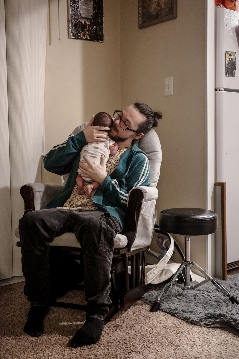 © Jordan Gale - Allyn and his newborn son River.