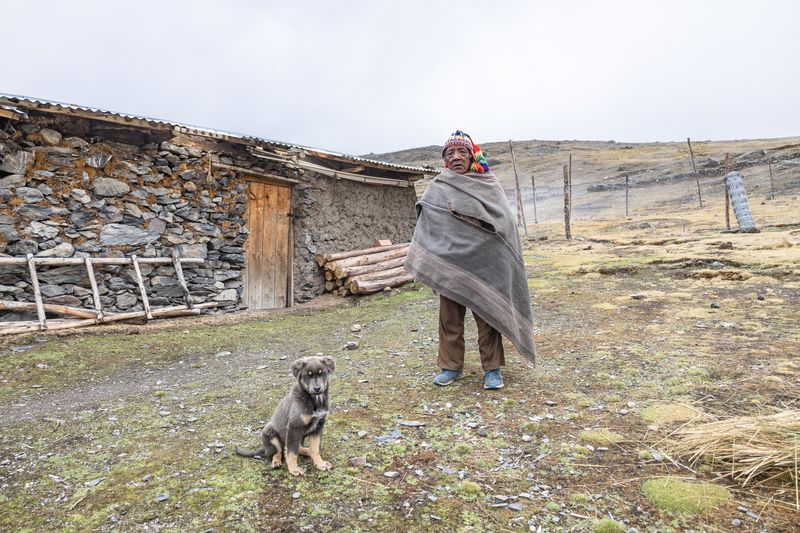© Bardia Kabirifar - Cusco Department, Peru - Lorenzo standing in front of his house located at Chua Chua village.