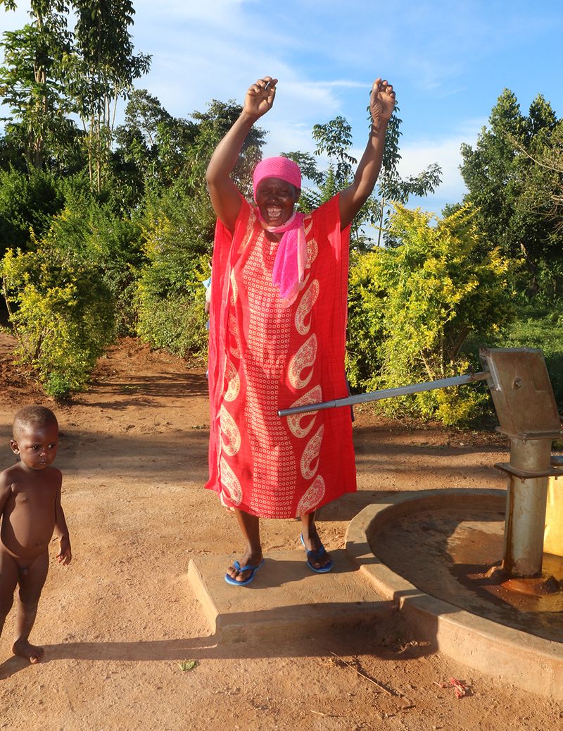 © Rhonda Welch - This lady had to walk two miles everyday for clean water - now there is water right by her home!