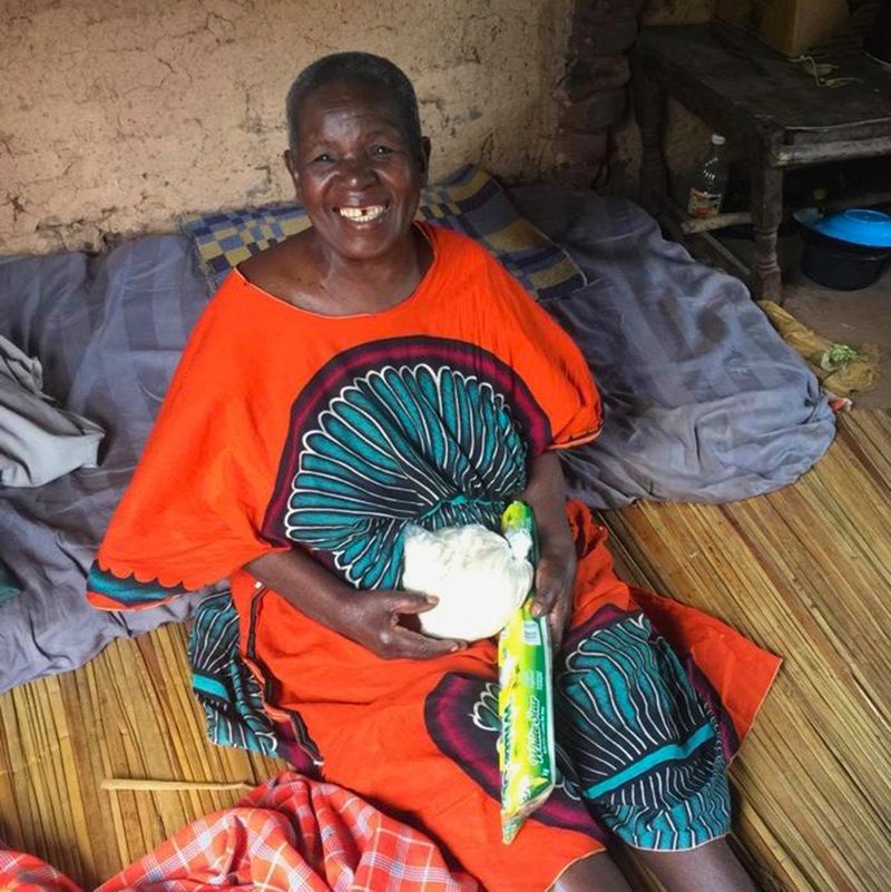 © Rhonda Welch - Happy widow that receives food and care