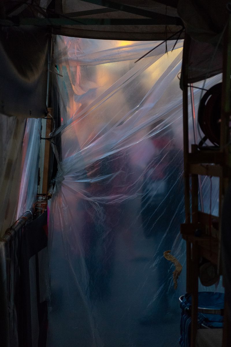 © Daniel Rolider - Protesters stand outside the Balfour Protest Camp in Jerusalem, Israel, December 23, 2020.