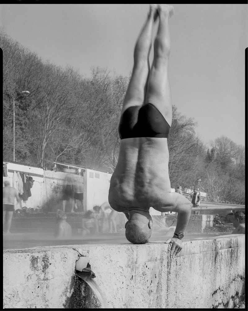© Christo Stankulov - Dancho, the sports teacher performing headstandfrom the series The Hot Waters - Varna, Bulgaria 2023