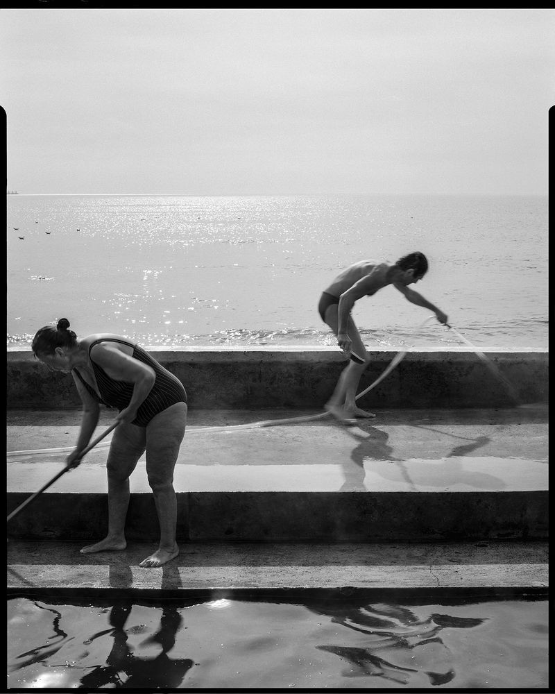 © Christo Stankulov - Cleaning the poolfrom the series The Hot Waters - Varna, Bulgaria 2023