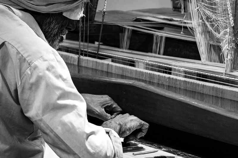 © Simone Campedelli - The worker and the machine merge into one gesture a choreography of patience and surrender.