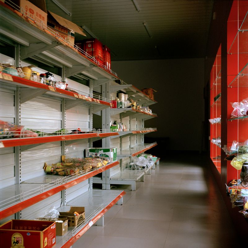 © Huiying Ore - A supermarket in Boten stocked with goods from China. Almost all businesses in the city are run by merchants from China.