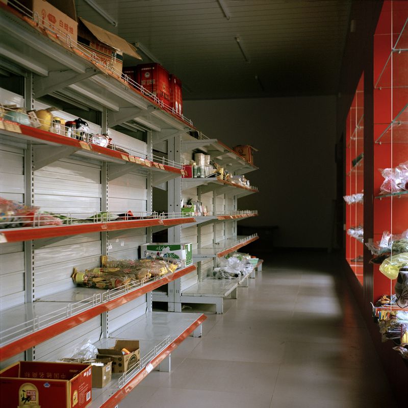 © Huiying Ore - A supermarket in Boten stocked with goods from China. Almost all businesses in the city are run by merchants from China.