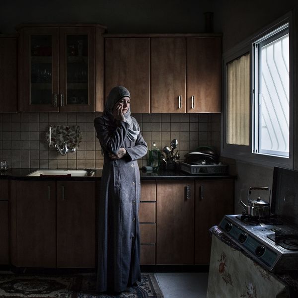© Antonio Faccilongo - Bethlehem, Palestine. Manal Assaf (32) is the wife of Imad (37). Imad was sentenced to 25 years.