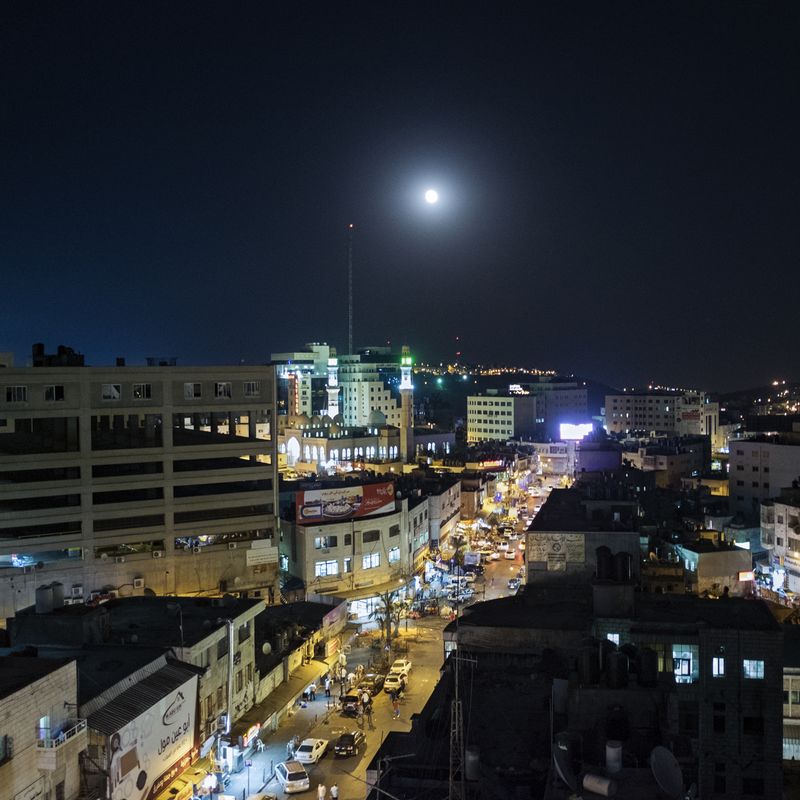 © Antonio Faccilongo - Ramallah, Palestine. A night view of Ramallah city center.