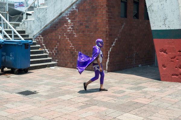© Alí Marín - A teenager dressed as a wrestler walks in a soccer stadium in the municipality of Naucalpan, State of Mexico.