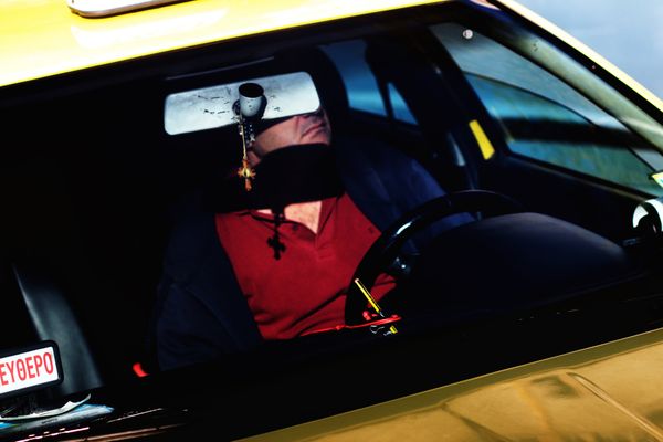 © Samantha Pess - Cab driver outside Athens