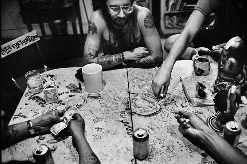 © Julie Glassberg - Playing Dice at the Chicken Hut, Brooklyn, NY.