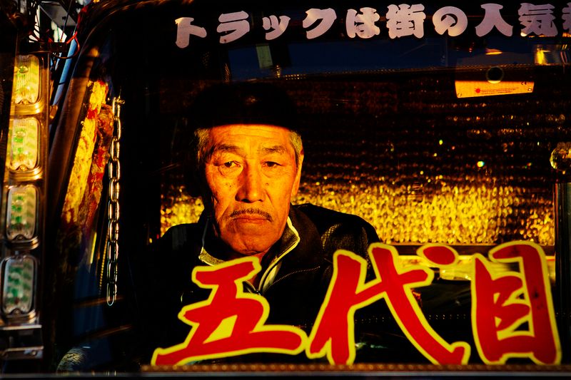 © Julie Glassberg - Driver in his dekotora. Kyushu Prefecture.