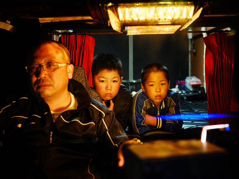 © Julie Glassberg - Minamida san and his sons in his Dekotora. Hokkaido prefecture.