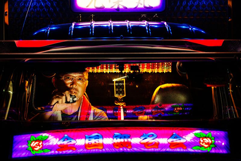 © Julie Glassberg - Motoie san on the radio in his mini dekotora. Shikoku Island.