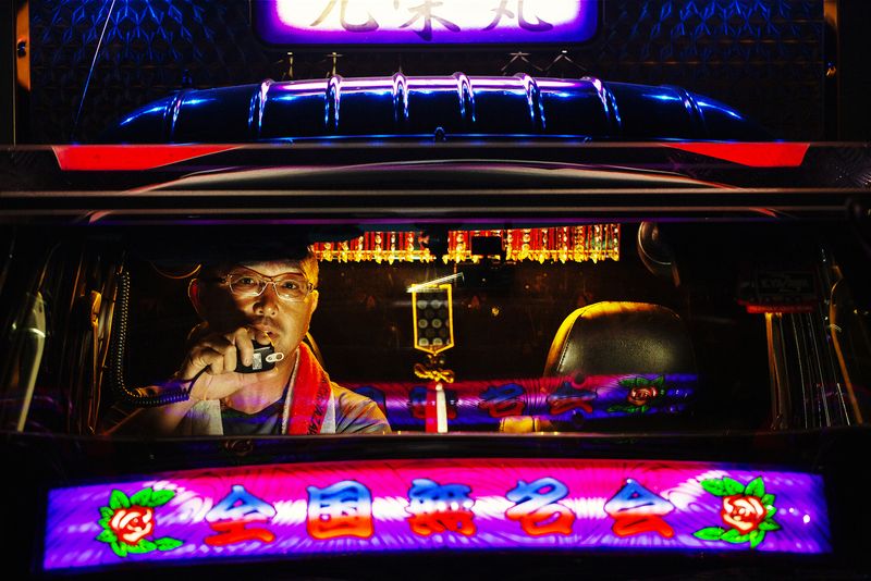 © Julie Glassberg - Motoie san on the radio in his mini dekotora. Shikoku Island.