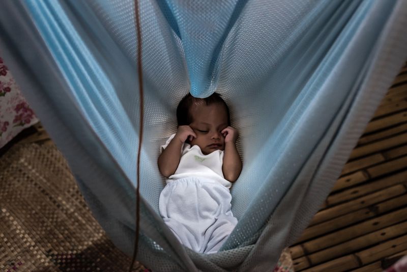 © Katherine Jack - A baby sleeps in a seashore home. Puerto Princesa City, Palawan, 2016