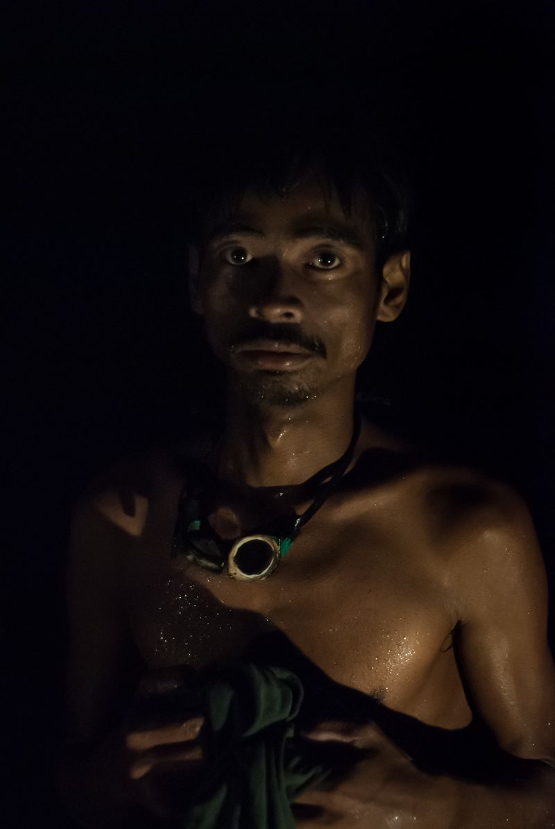 © Katherine Jack - An indigenous Calamian Tagbanua man feeling cold and tired after spear-fishing. Palawan 2008