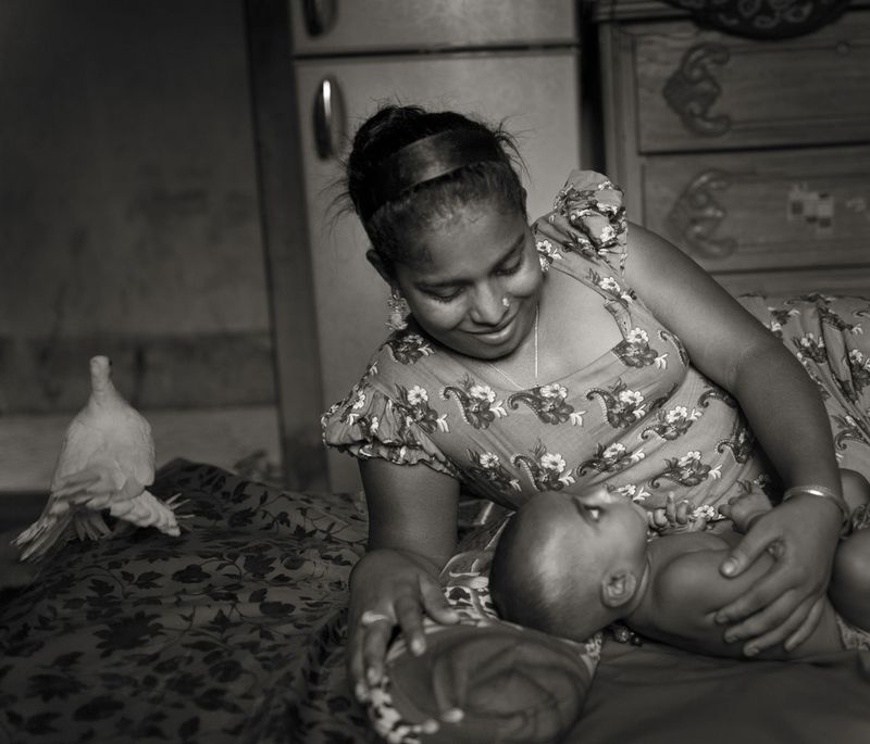 © Shahria Sharmin - "Always desiring to be a mother I have adopted Boishakhi. But what if she calls me father someday ! " Salma (27)