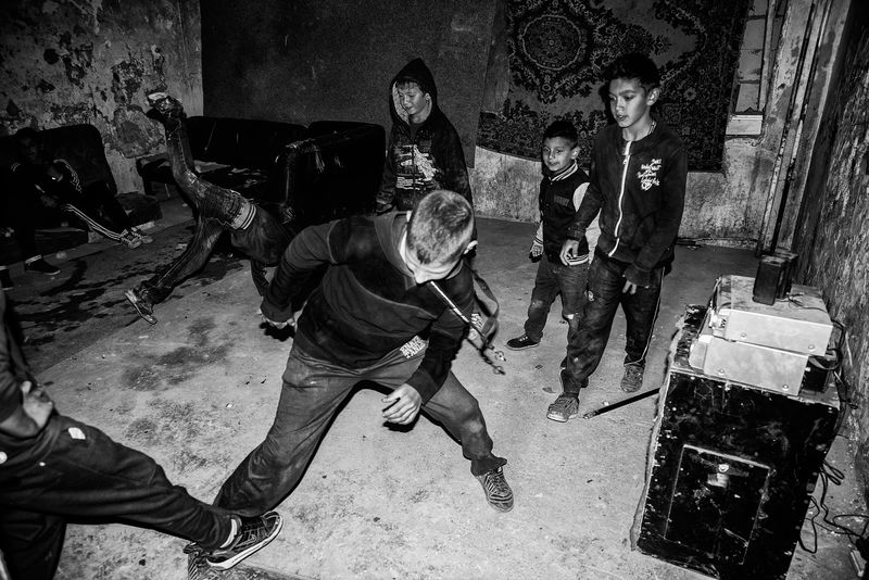 © Jana Plavec - Young boys playing football in their improvised clubhouse.