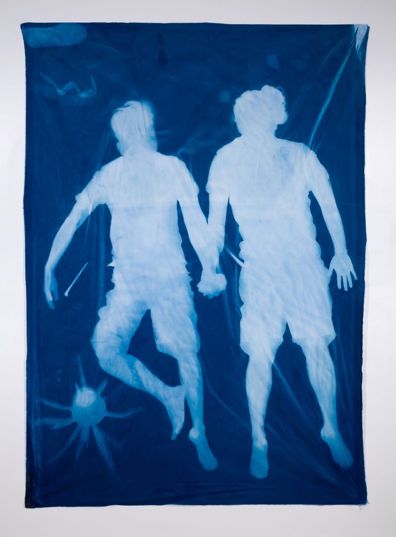 © Jackie Neale - Crossing Over: Immigration Stories, 2017 Cotton fabric cyanotype portraits 5x7ft