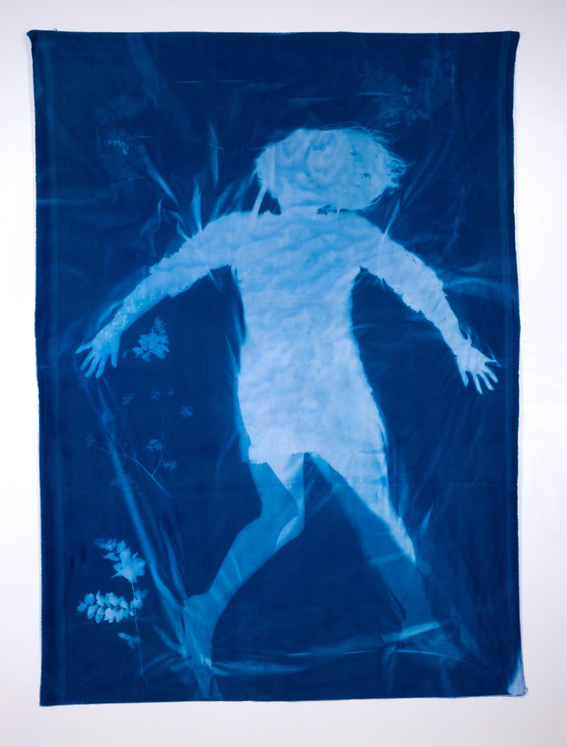 © Jackie Neale - Crossing Over: Immigration Stories, 2017 Cotton fabric cyanotype portraits 5x7ft