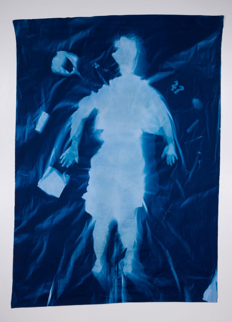 © Jackie Neale - Crossing Over: Immigration Stories, 2018 Cotton fabric cyanotype portraits 5x7ft