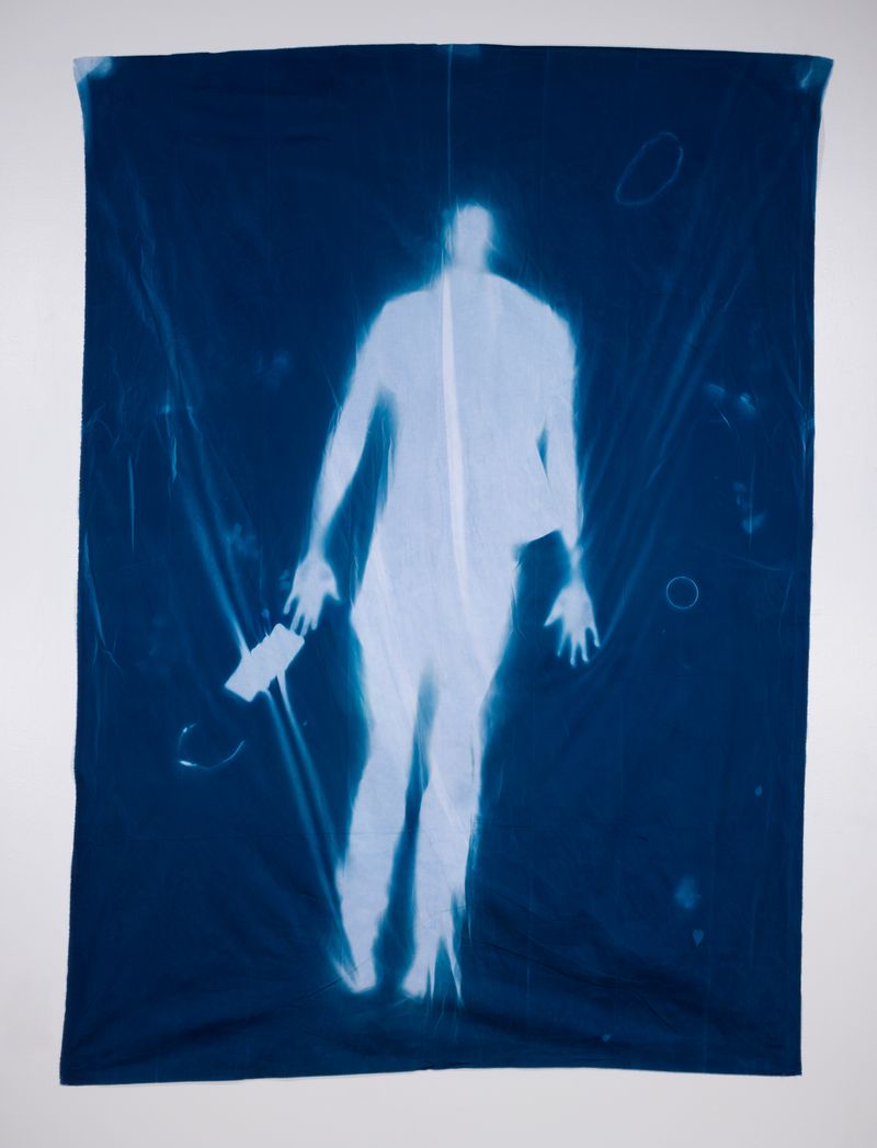 © Jackie Neale - Crossing Over: Immigration Stories, 2018 Cotton fabric cyanotype portraits 5x7ft