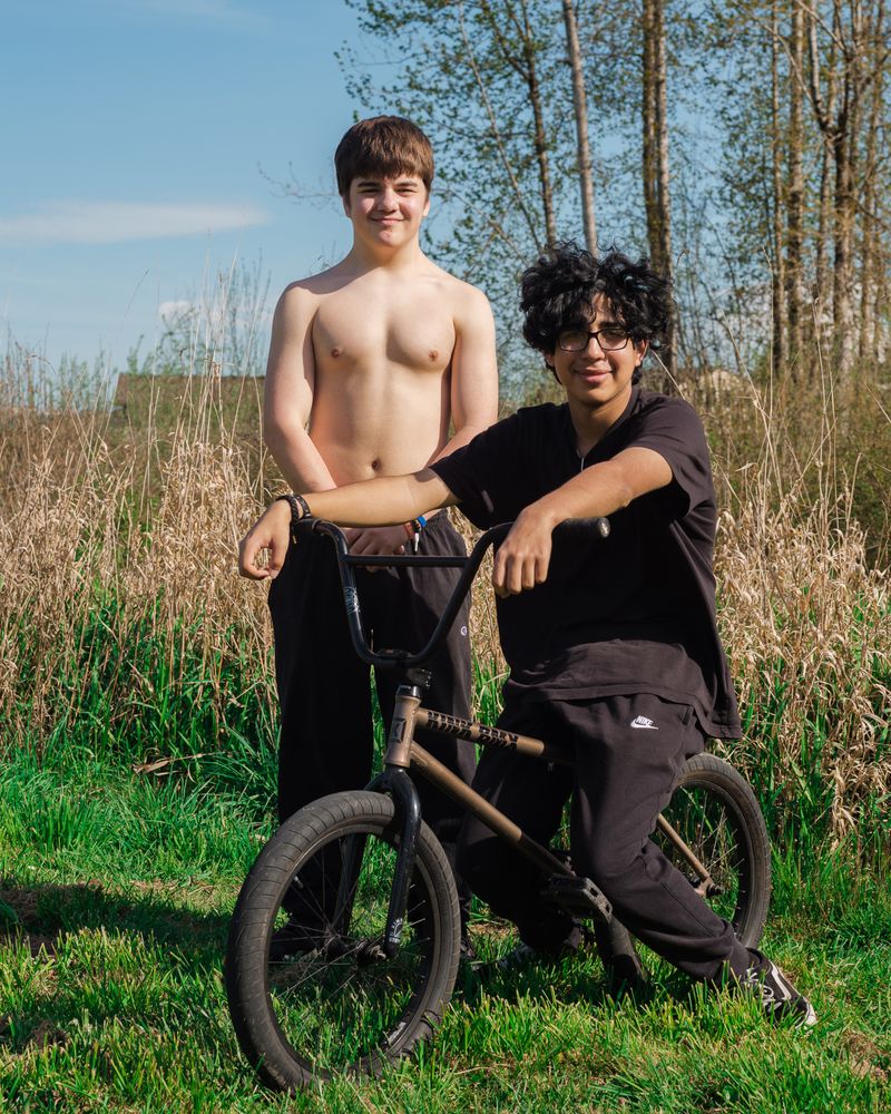 © Alana Celii - Gage and Jaden on Foothills Trail in Puyallup, WA. The rail trail snakes through the Puyallup River valley.