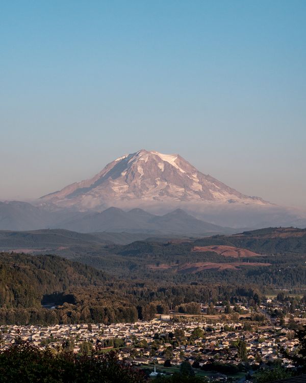 © Alana Celii - Mt. Rainier looming over the town of Orting as seen from South Hill, WA.
