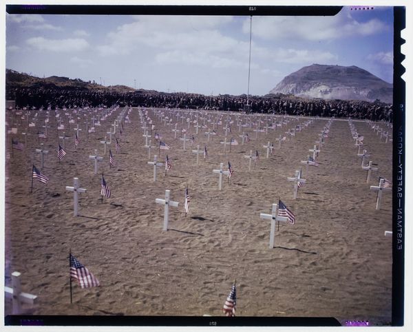 © Marianne Ingleby - Mass grave of US soldiers in spring of 1945 on Iwo Jima with Mount Suribachi in the background.