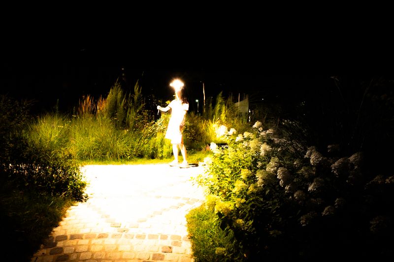 © G.S - The Summons.He stops at the edge. Light pools at his feet—as if calling him in.