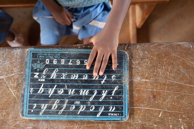 © Eleri Griffiths - The little finger is daubed with a purple marker to ensure that no child is vaccinated for polio twice by mistake.